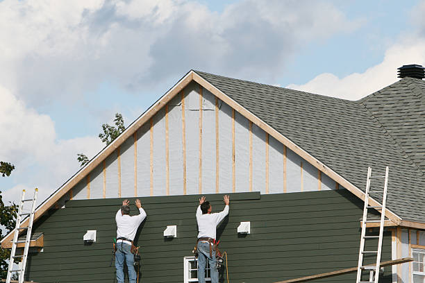 Professional Emergency Siding Repair technician working in Grassflat, PA